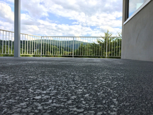 Detail textured overlay magnolia tx floor coating by Real Seal Coatings