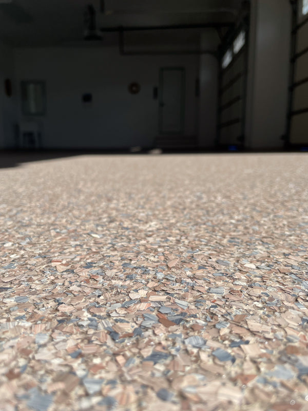 Flake detail spring tx floor coating by Real Seal Coatings
