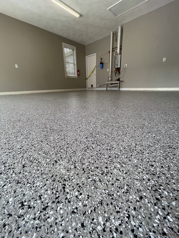 Domino 2 car garage tx floor coating by Real Seal Coatings