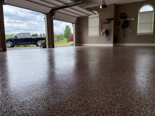 2 car garage red flake spring tx floor coating by Real Seal Coatings